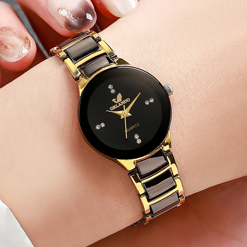 Damen Quarzuhr mit rundem Zifferblatt und Metallarmband