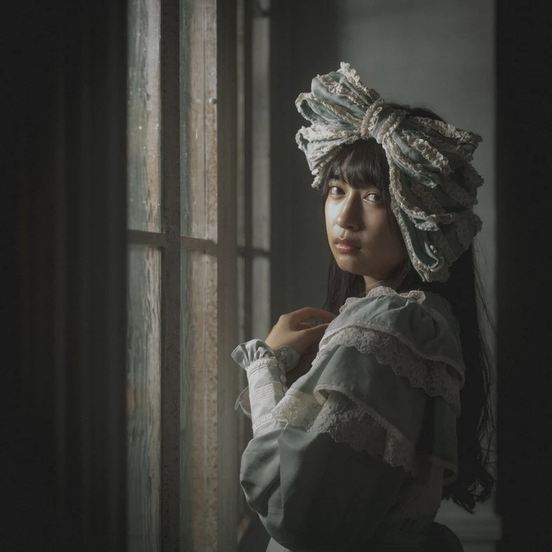 Pensive Woman by Window