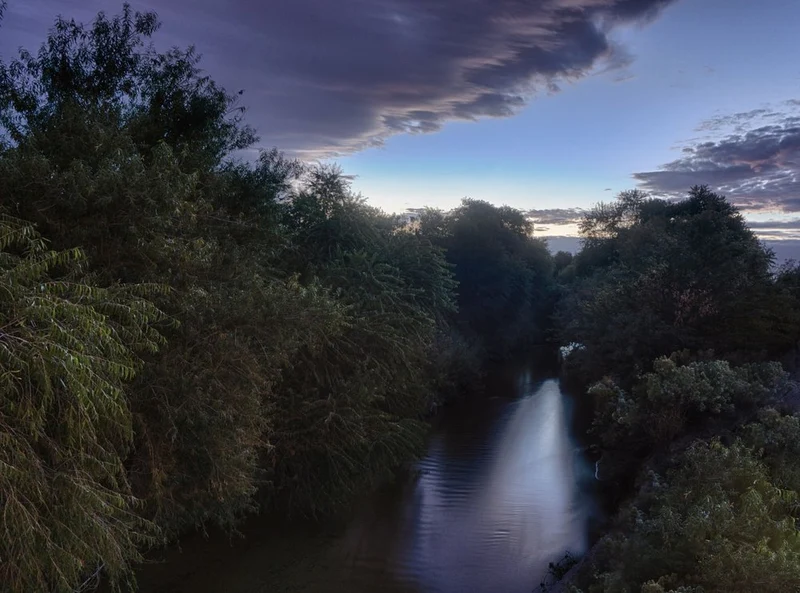 Dusk River Through Trees