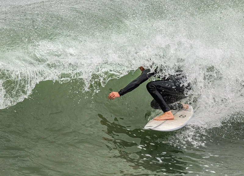 Surfer in Green Wave