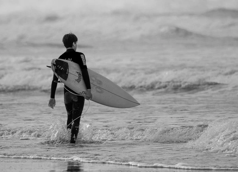 Solitary Beach Surfer