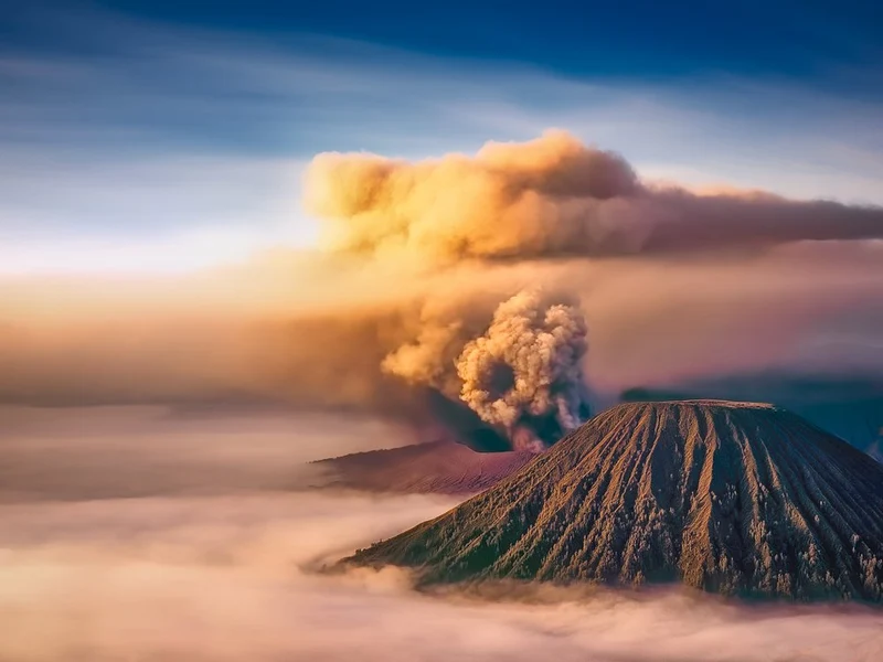 Erupting Volcano At Sunrise