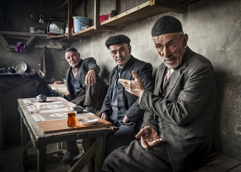 Three Men Chatting