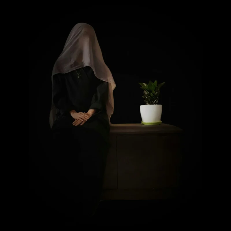 Contemplative Veiled Woman