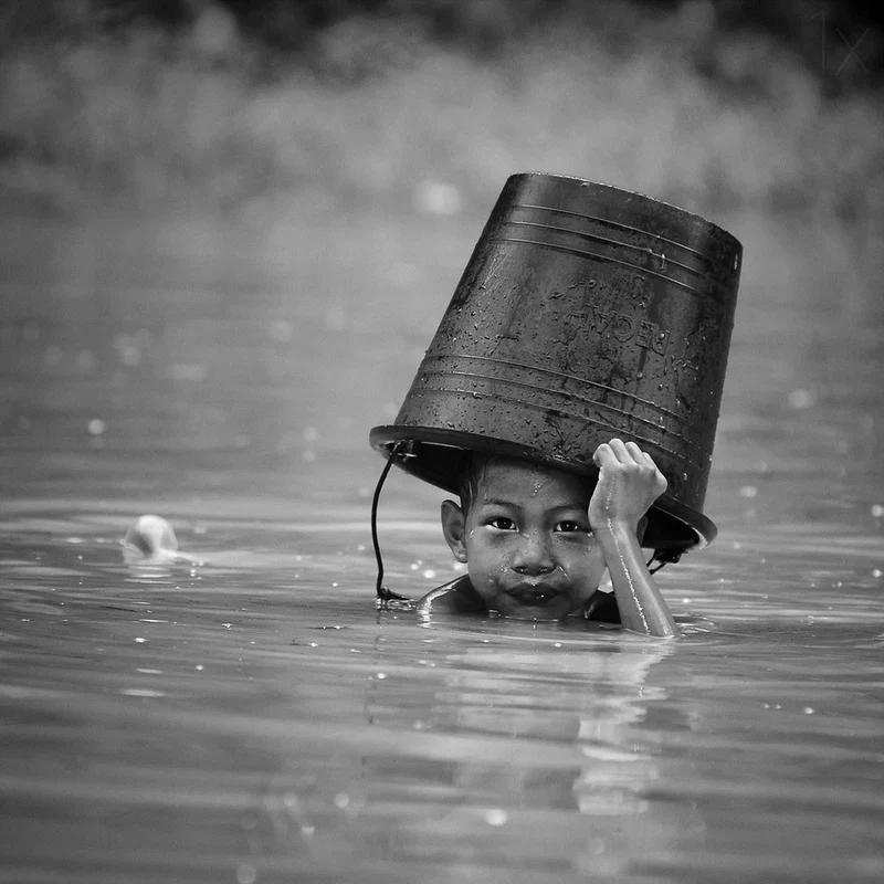 Playful Boy In Water