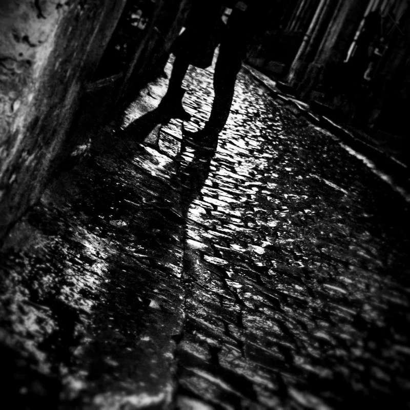 Lone Figure Dark Alley