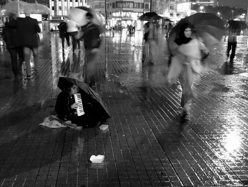 Rainy Night Street Musician