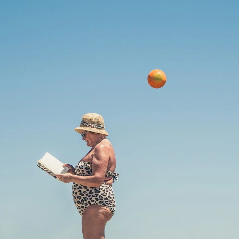 Woman Reading Sunny Sky