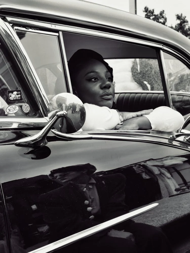 Woman in Classic Car
