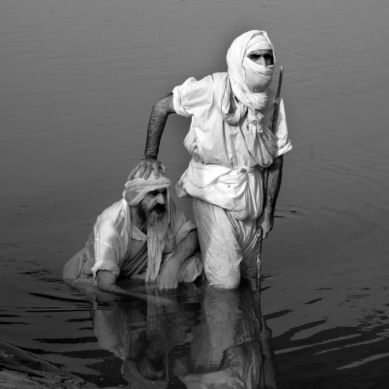 Men In Sacred Waters