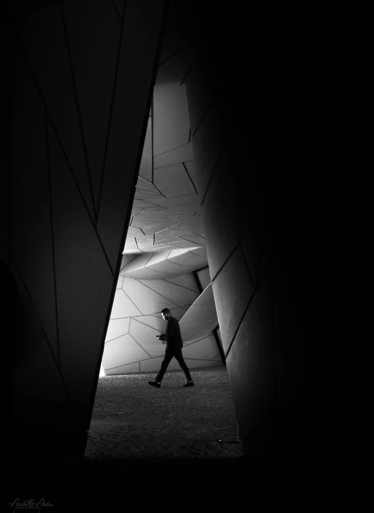 Man in Geometric Passage