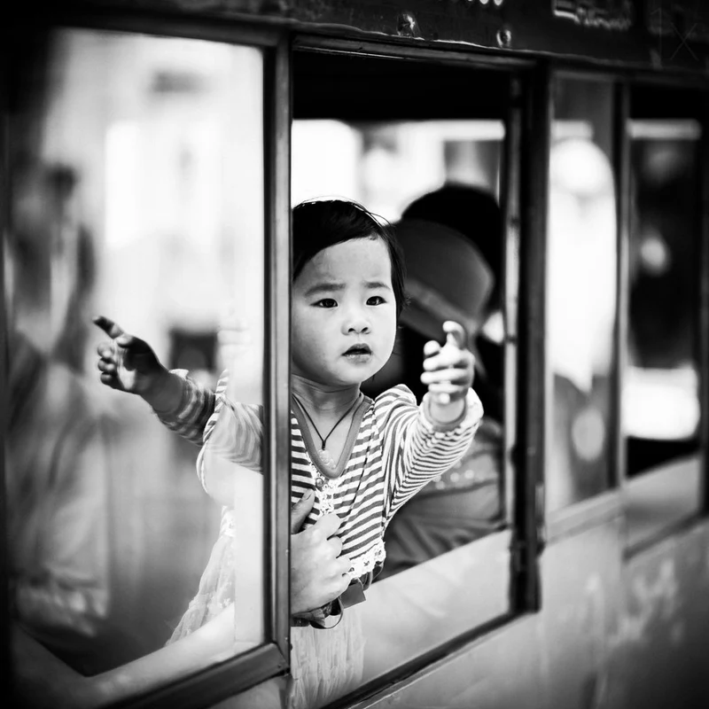 Curious Child at Window