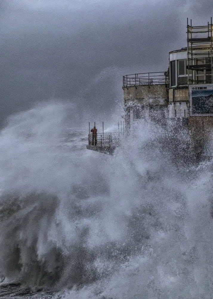Man Watches Storm Waves
