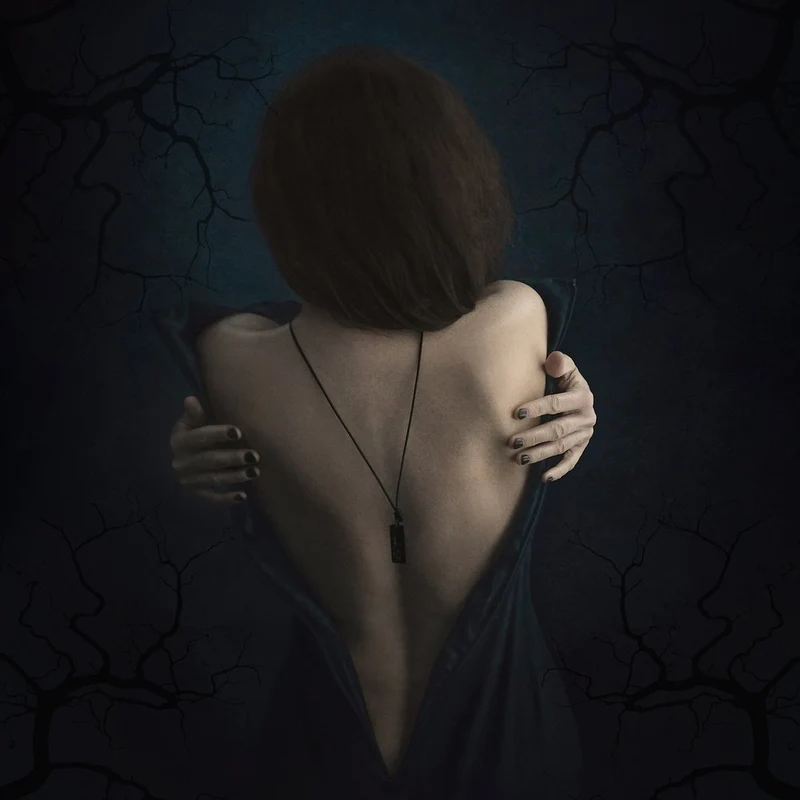 Woman's Dark Embrace