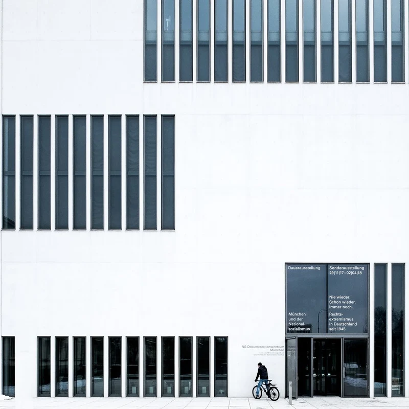 Modern White Building Cyclist