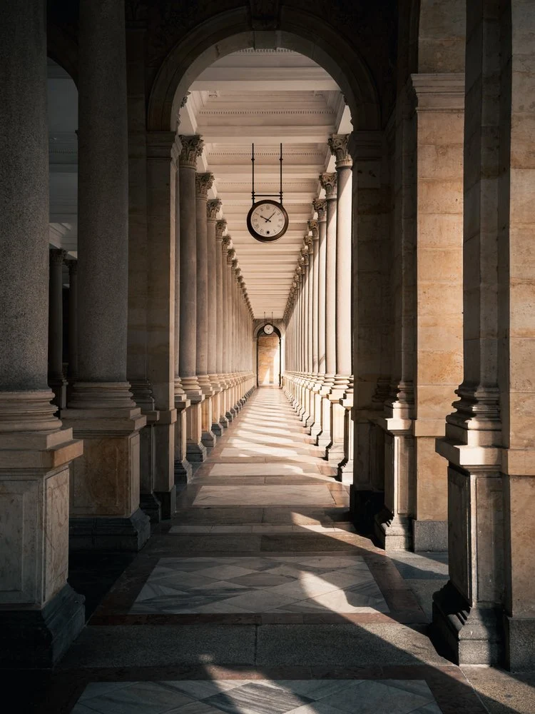 Arched Hallway With Clock