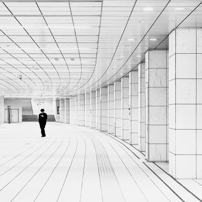 Alone in Modern Hallway