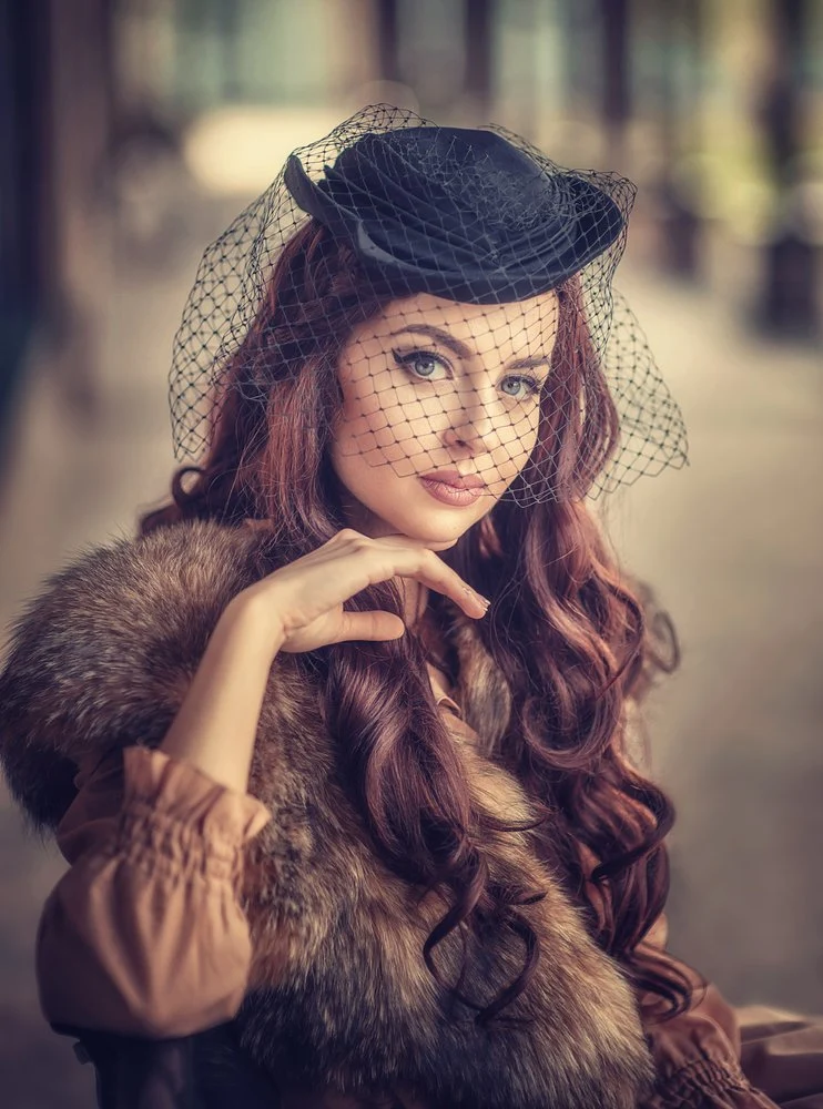 Elegant Veiled Woman