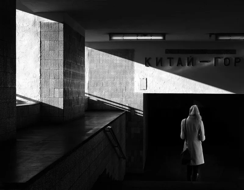 Woman in Metro Shadows