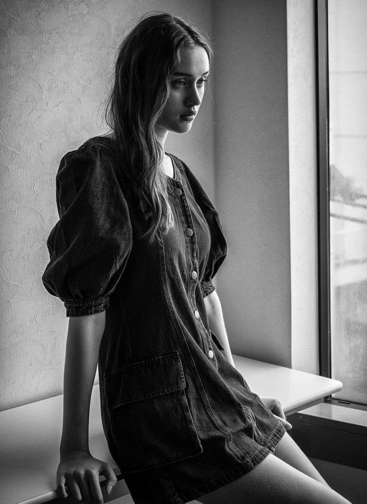 Pensive Woman By Window