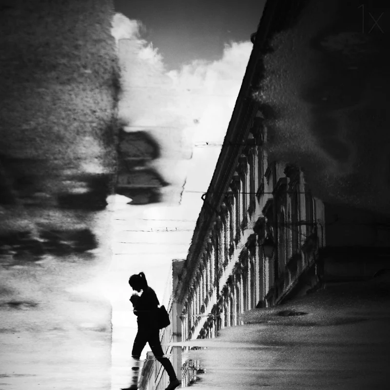 Woman Puddle Reflection