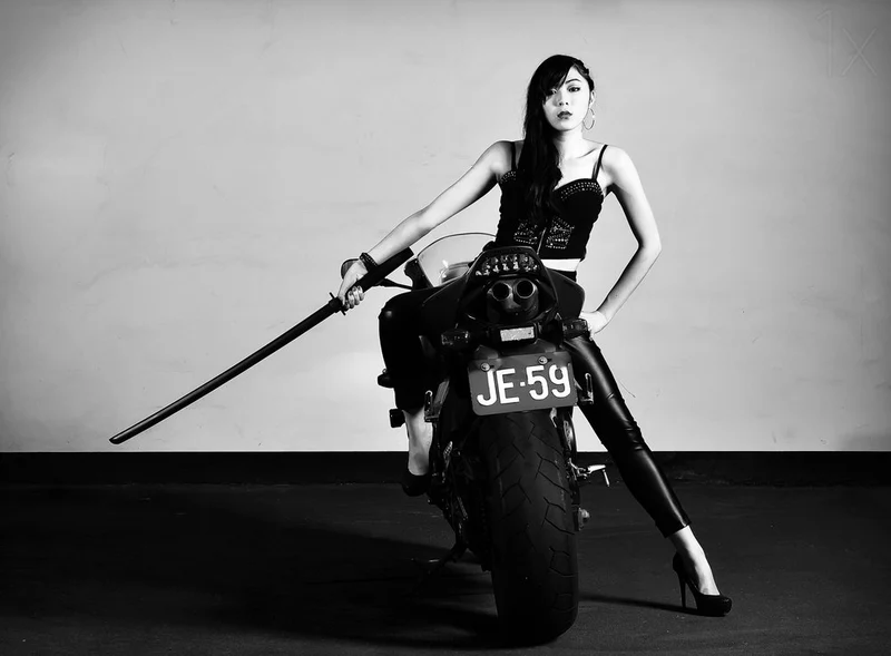 Sleek Woman Katana Rider