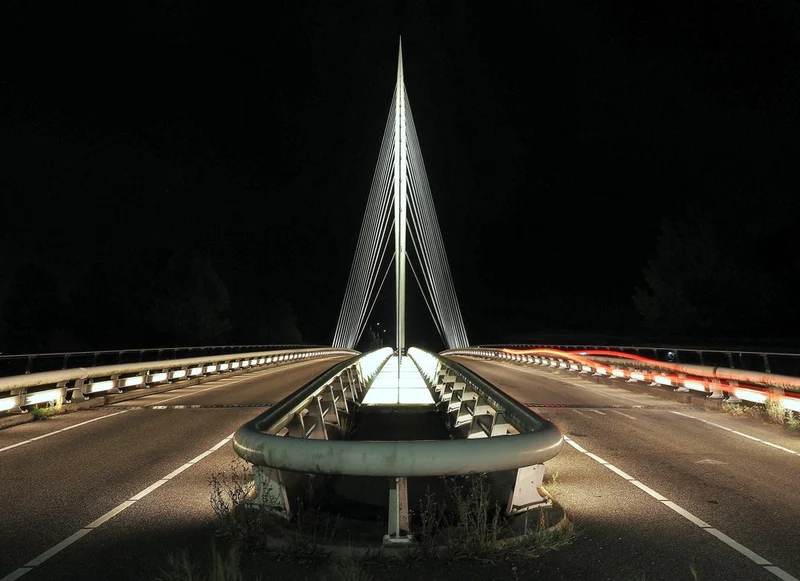 Illuminated Bridge At Night