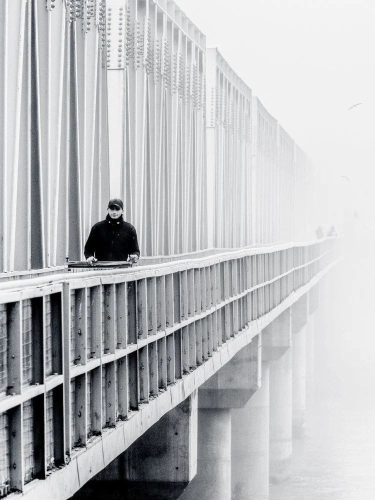 Man on a Misty Bridge