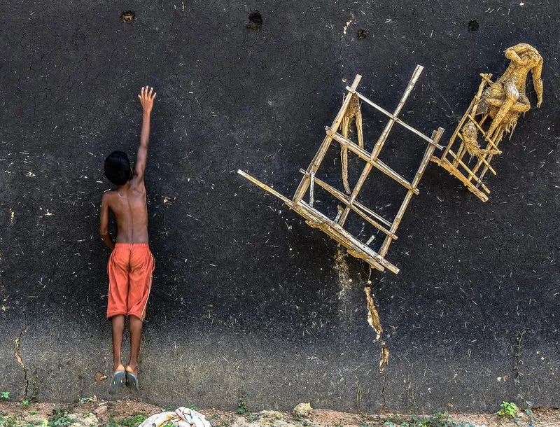 Boy Reaching Up