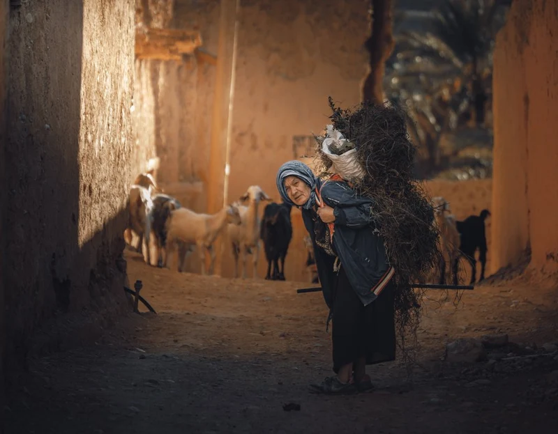 Traditional Woman Carrying Load