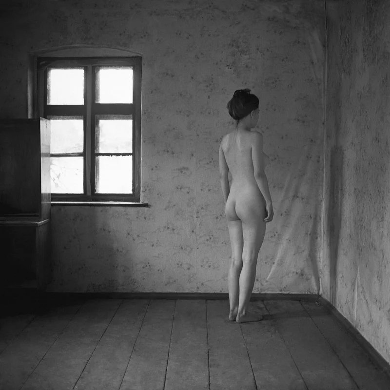 Woman By Window Light