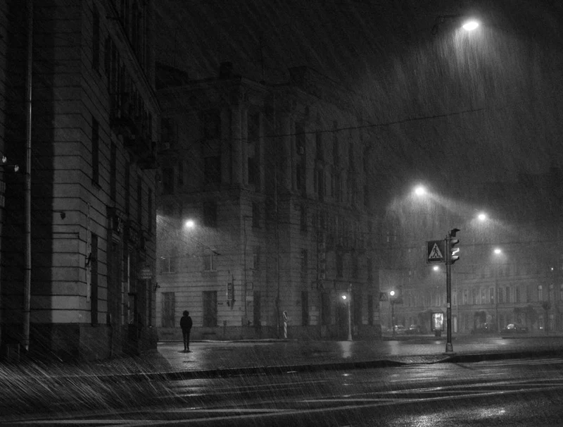Lone Figure Rainy Night
