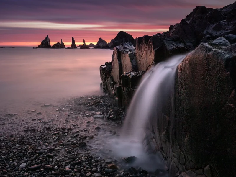 Purple Sky Coastal Waterfall
