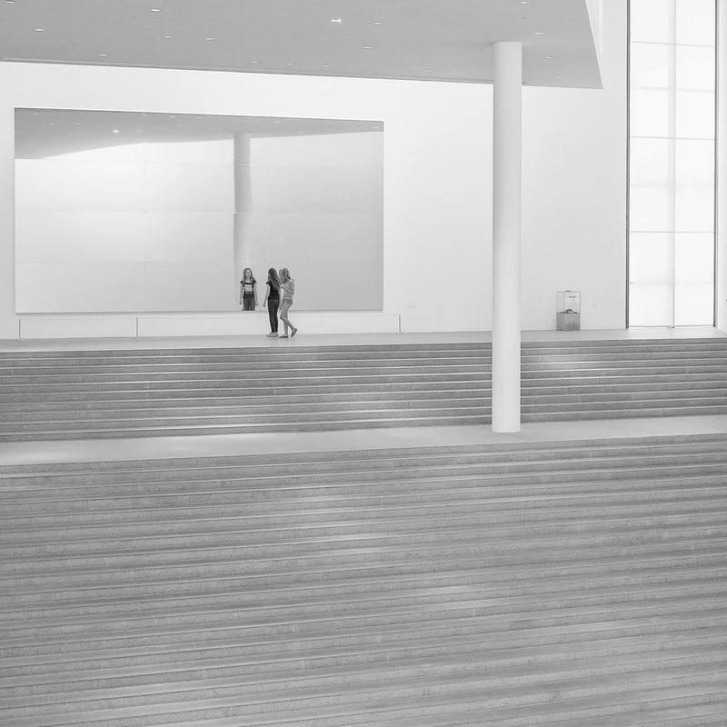 Women on Museum Stairs