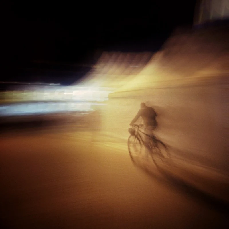 Blurred Night Cyclist