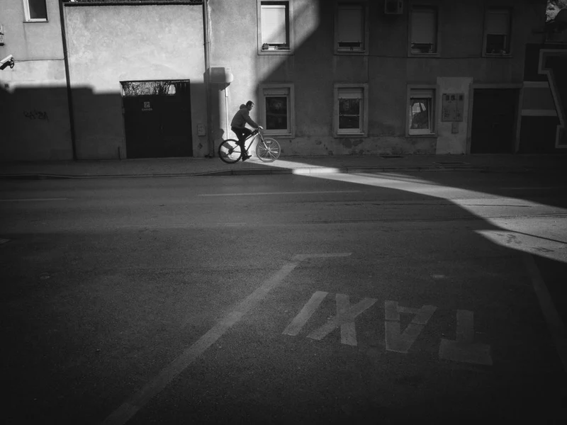 Urban Cyclist Shadow Play