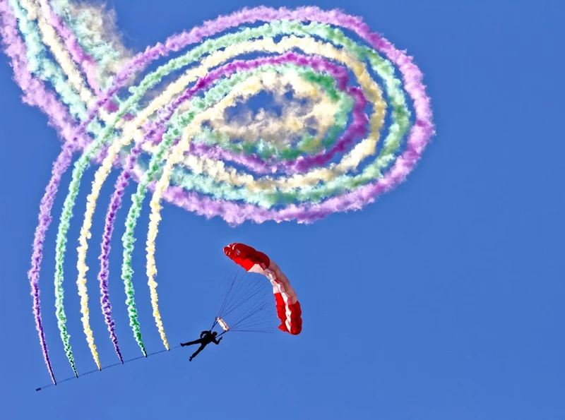 Skydiver Colorful Smoke Trails