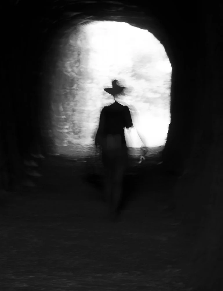 Mysterious Figure Emerging Light