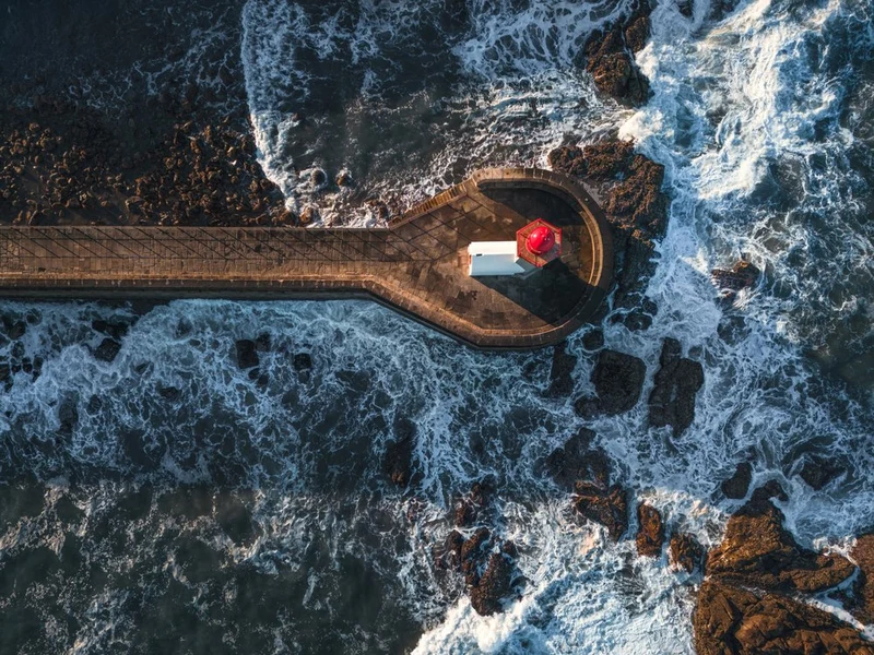 Red Lighthouse Ocean Waves