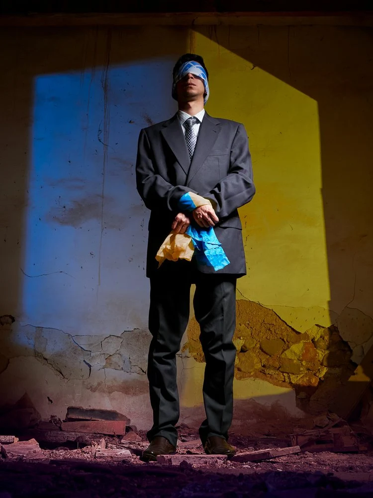 Blindfolded Man In Crisis