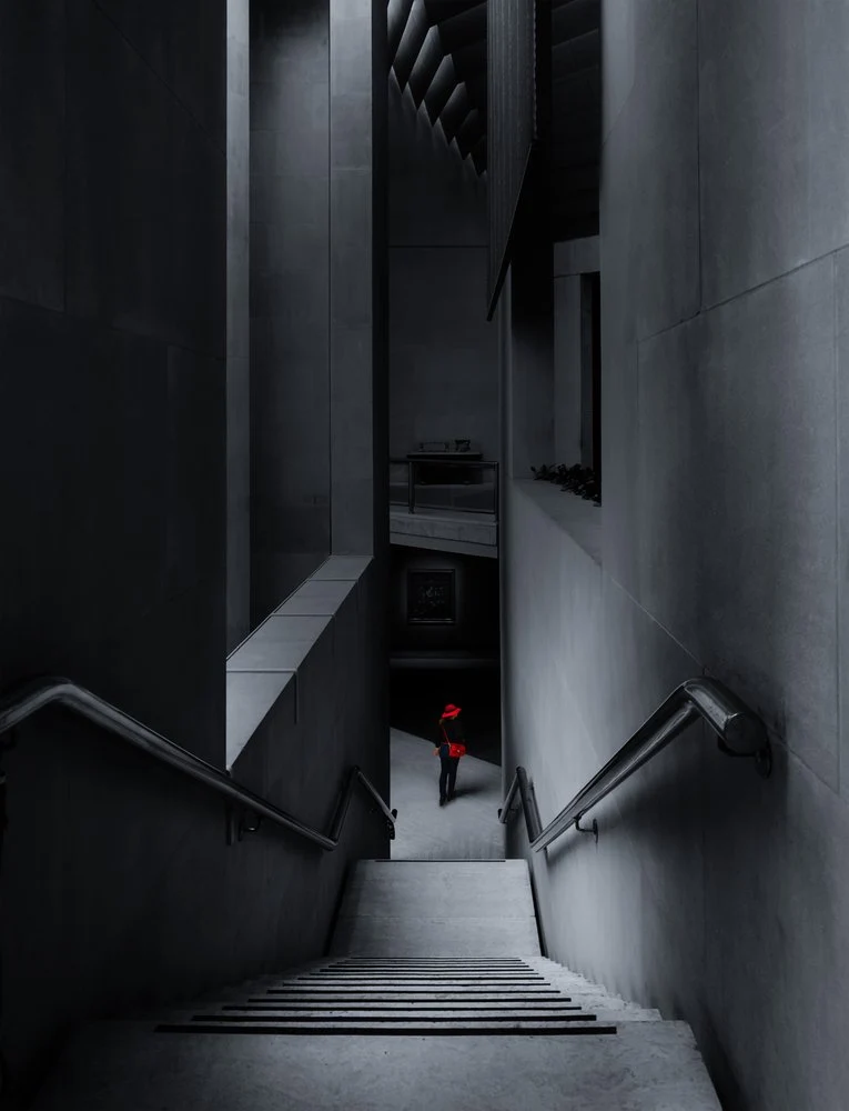Red Figure on Stairs