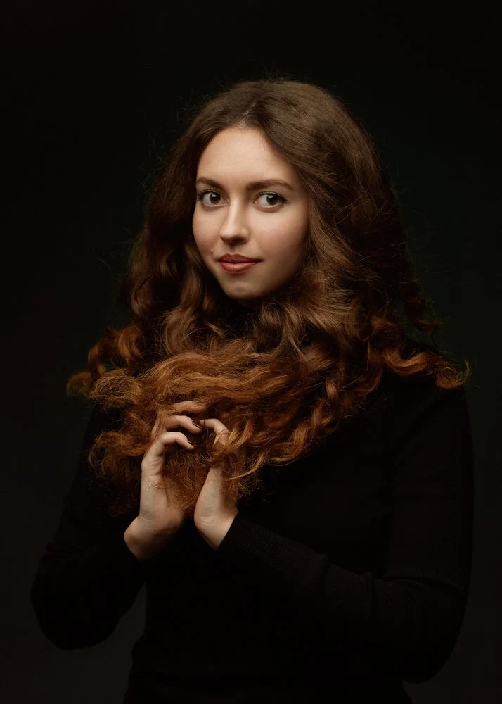Captivating Curly Haired Woman