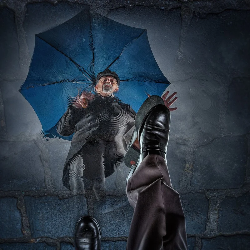 Man's Rainy Reflection