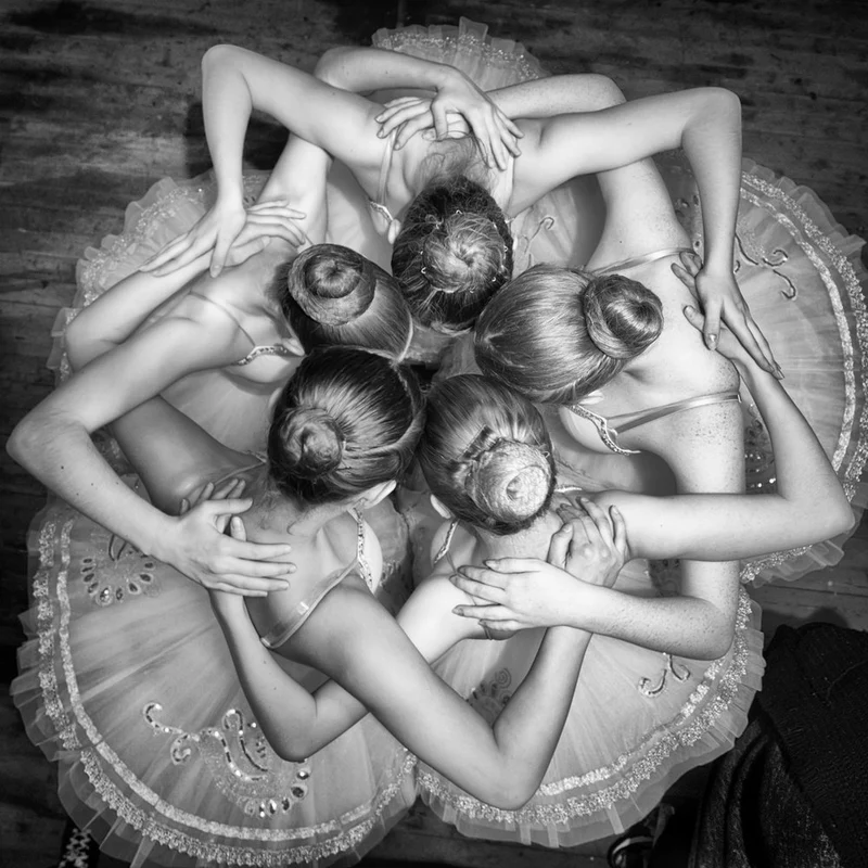 Dancers' Graceful Huddle