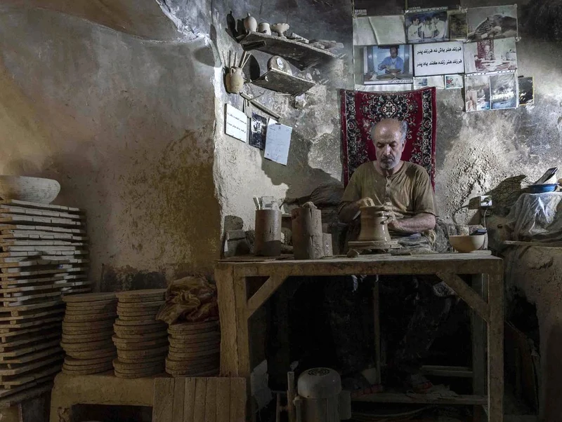 Traditional Potter At Work