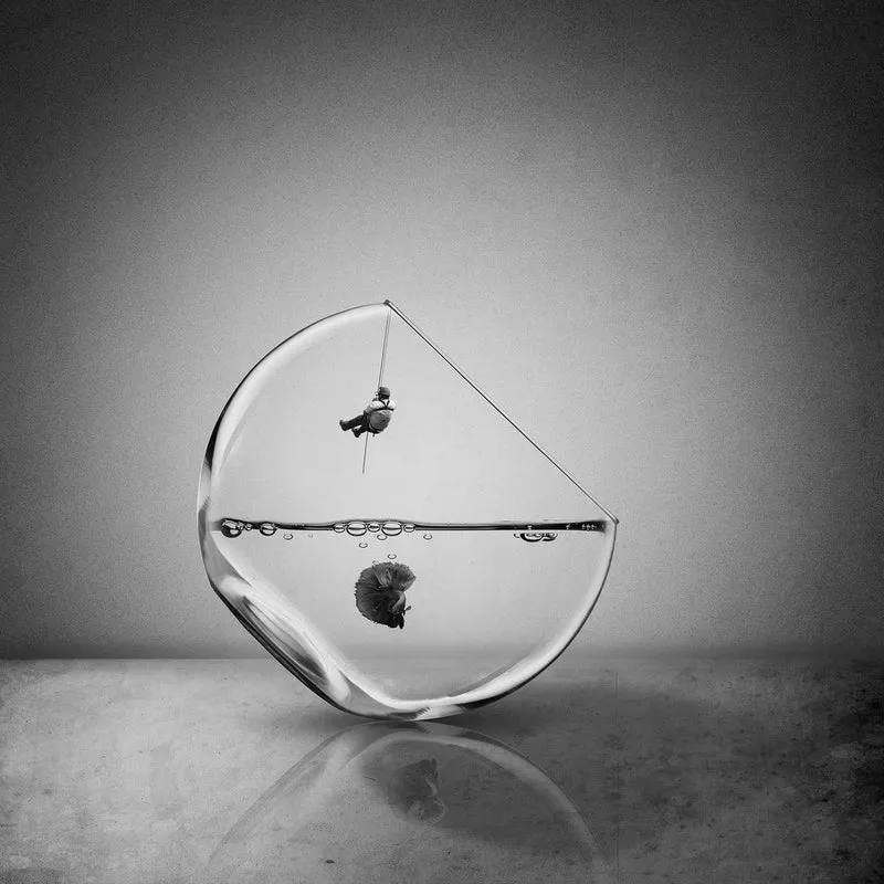 Man Fishing In Glass
