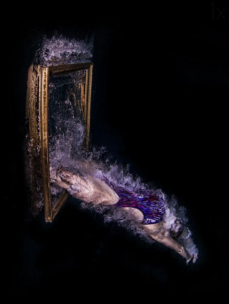 Swimmer Diving Through Frame