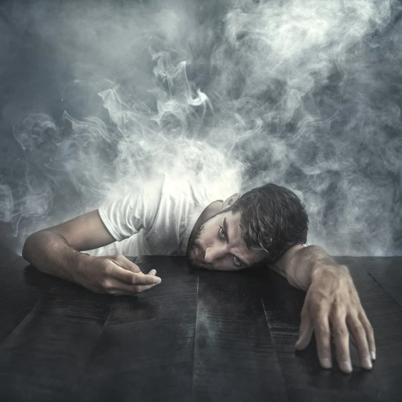 Weary Man in Smoke