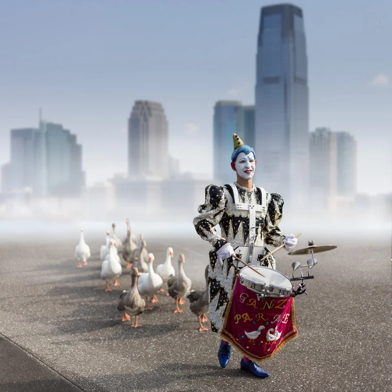 Clown Leads Geese Parade