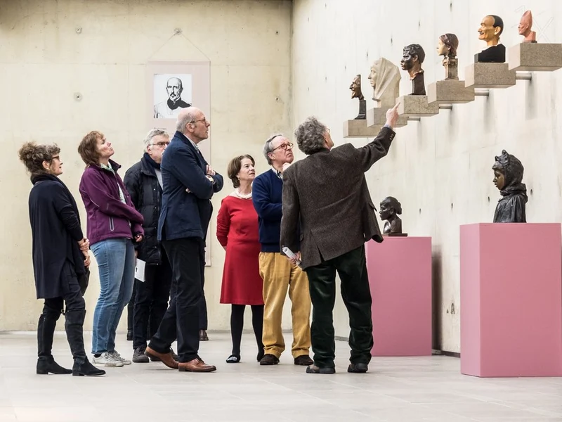 Museum Visitors Viewing Art